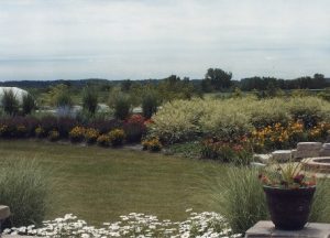 landscaping with large bushes and flowers