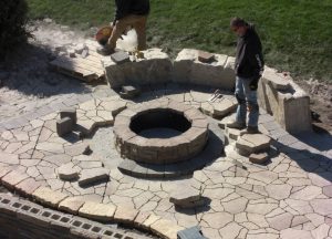 large stone patio under construction