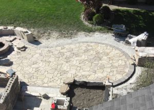 large stone patio under construction