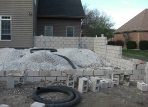 Construction on a large stone outdoor living space