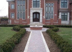 decorative brick walkway and water feature