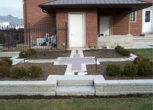 brick walkway outside of a brick house