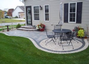 brick outdoor living and dining space